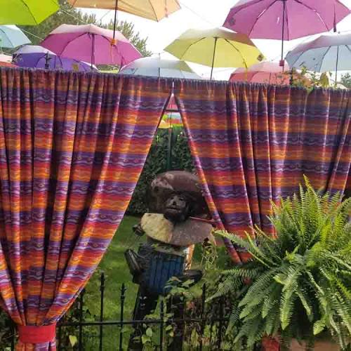 Adeline's Retreat Canopy of Color Umbrella Garden