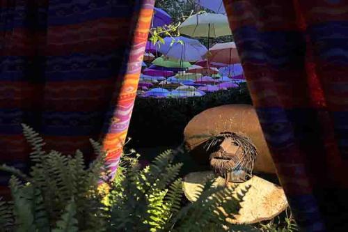 Adeline's Retreat Canopy of Color Umbrella Garden